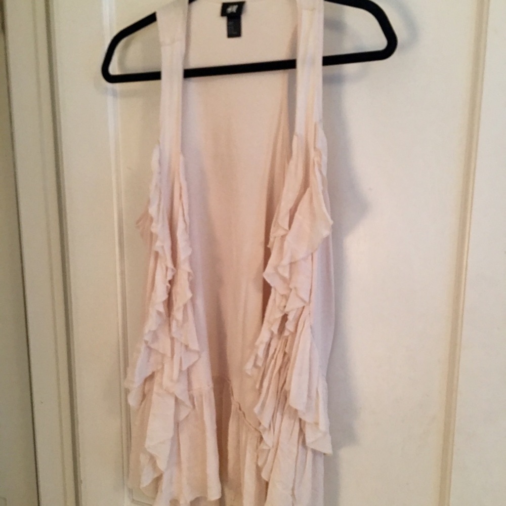 Open cream vest
